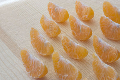 Close-up of orange on wooden table