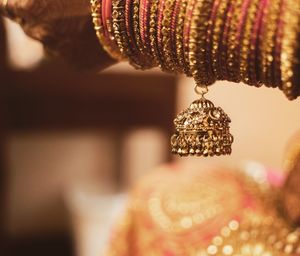 Cropped hand of woman wearing bangles