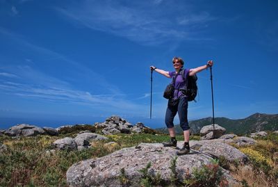 Active senior woman during a hike in mountains