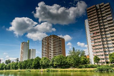 Buildings in city against sky