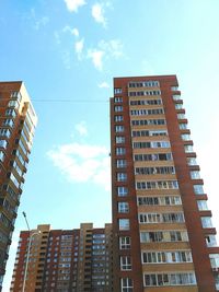 Low angle view of skyscrapers against sky