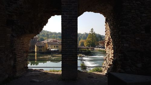 Buildings seen through arch