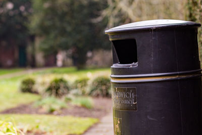 Close-up of mailbox on field