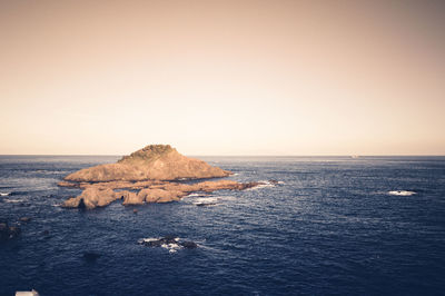 Scenic view of sea against clear sky