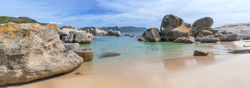 Panoramic view of rocks on beach against sky . boulders beach  capetown  south africa
