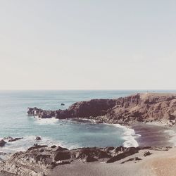 Scenic view of sea against clear sky