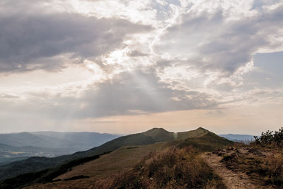 Scenic view of landscape against sky during sunset