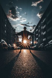 View of city street at sunset