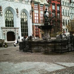 Street by buildings in city