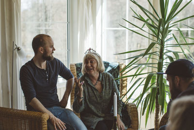 People sitting by window