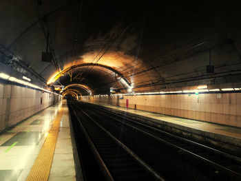 Illuminated railroad station platform