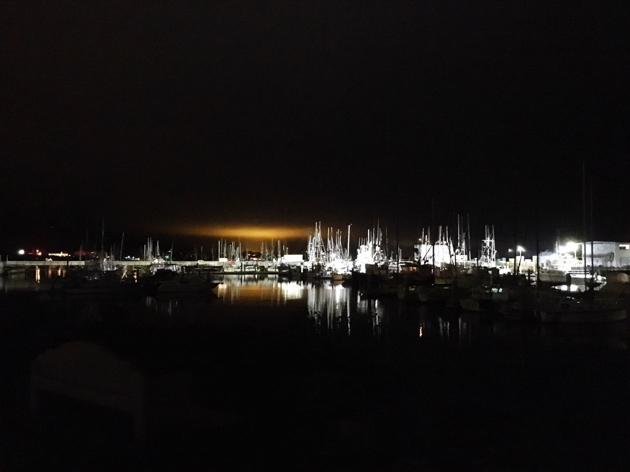 night, reflection, water, nautical vessel, illuminated, moored, boat, no people, marina, harbor, mode of transport, outdoors, built structure, waterfront, tranquility, sailboat, sea, yacht, sky, nature, mast, building exterior, architecture, beauty in nature