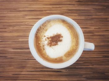 High angle view of cappuccino on table