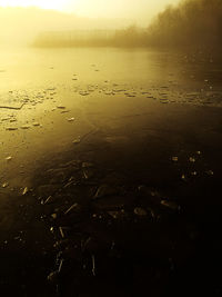 Scenic view of sea against sky at sunset