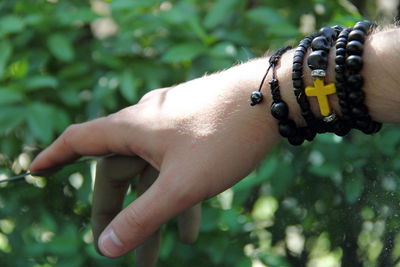 Cropped hand of man wearing bracelets