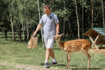 Full length of a man walking in park