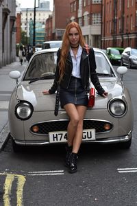 Young woman in car