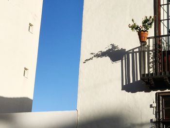 Low angle view of building against blue sky