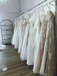 Wedding dresses hanging on a rack 