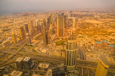 High angle view of cityscape against sky during sunset