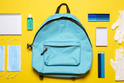 High angle view of yellow and blue on table