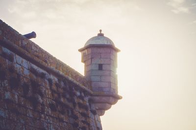 Low angle view of lighthouse against sky