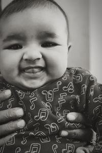 Portrait of cute baby at home