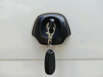 Close-up of key in car door