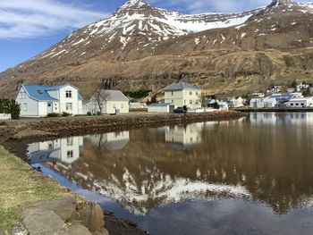 Houses in a beautiful landscape reflected in the water