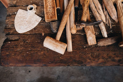 High angle view of logs on wooden table