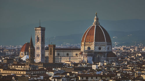 View of cathedral in city against sky