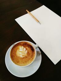 High angle view of coffee on table