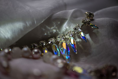 Close-up details of necklace with swarovski crystal stones