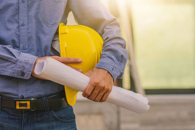 Midsection of man working at construction site