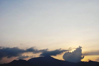 Scenic view of silhouette mountain against sky during sunset