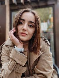 Portrait of young woman looking away