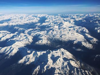 Snowy mountains from a high altitude