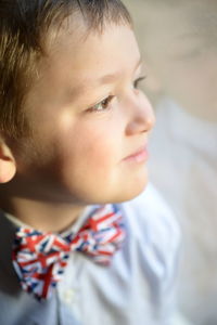 Close-up of boy wearing american flag bow tie
