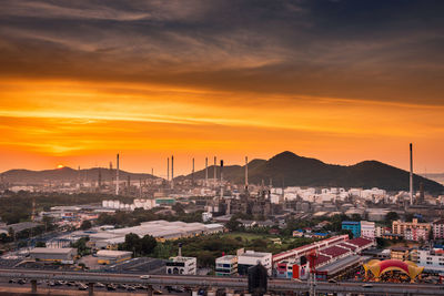 High angle view of buildings against sky during sunset