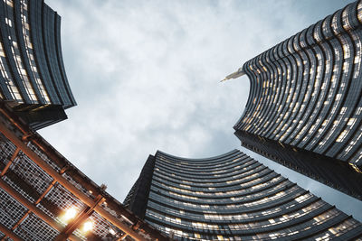 Low angle view of modern buildings against sky