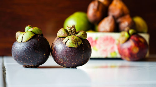 Close up of the mangosteen on the table