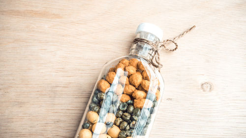 Close-up of food in bottle on table