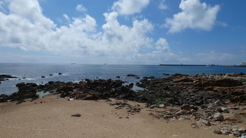 Scenic view of beach against sky