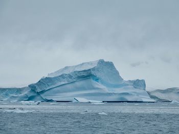 Scenic view of frozen sea against sky
