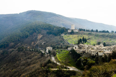 High angle view of castle on mountain against sky