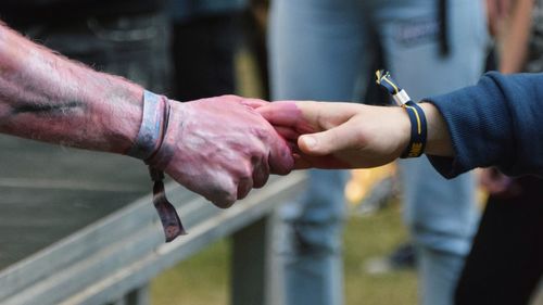 Cropped image of people shaking hands
