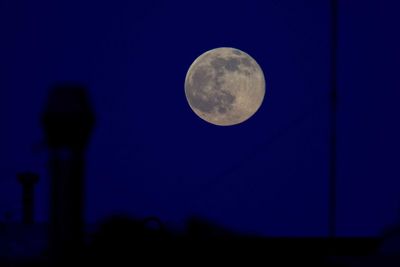 Low angle view of moon in sky