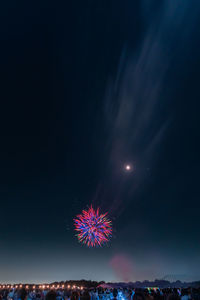 Firework display at night