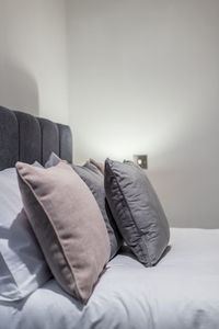 Midsection of sofa on bed at home