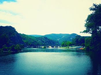 Scenic view of river against sky